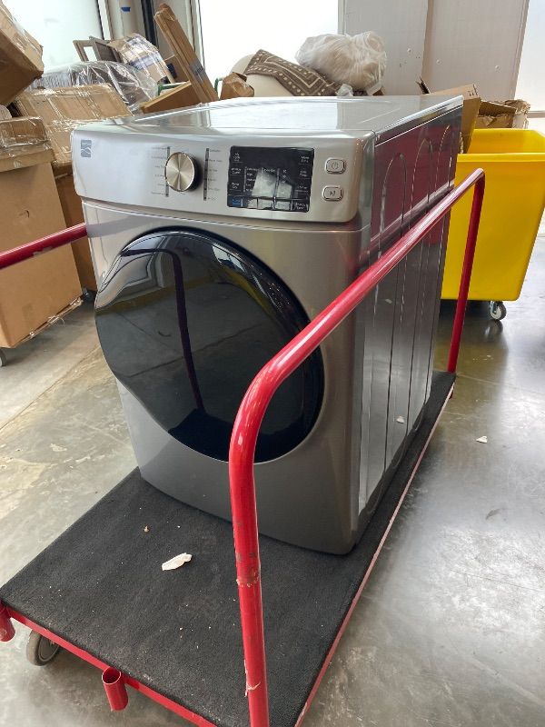 Photo 1 of *NON-FUNCTIONAL*
Kenmore 8.0 cu. ft. Front Load Electric Dryer with Wrinkle Guard & Accela Steam to Reduce Wrinkles, Static & Odors - Smart Sensor Drying - LED - ENERGY STAR Certified - Metallic Silver