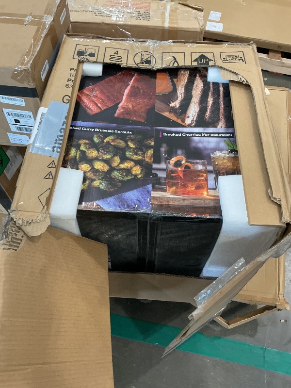 Photo 1 of ****UPDATED 8/2*** GE Profile™ Smart Indoor Pellet Smoker + Accessories Bundle, Includes Four 1lb Bag, Strainer, 20-pack of Drip Pan Liners, and Prep Tray, Stainless Steel, Carbon Black