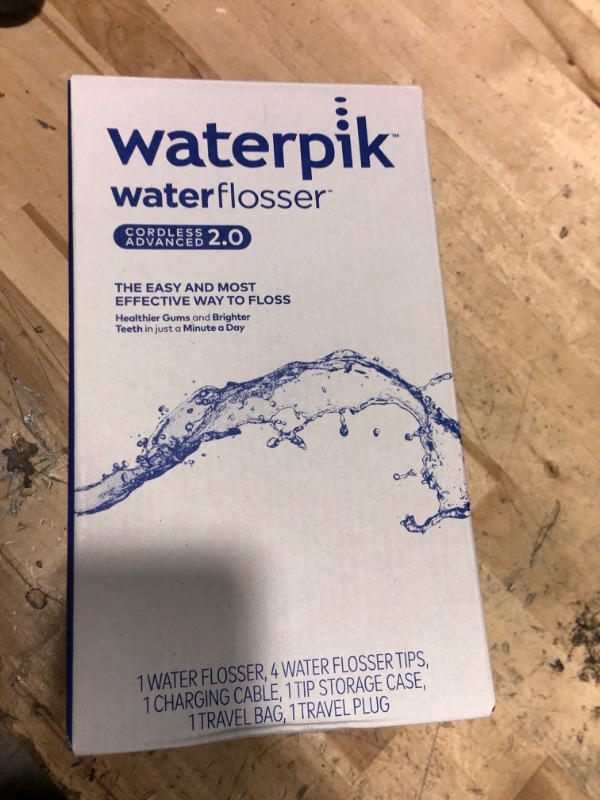 Photo 1 of Waterpik Cordless Advanced 2.0 Water Flosser For Teeth, Gums, Braces, Dental Care With Travel Bag and 4 Tips, ADA Accepted, Rechargeable, Portable, and Waterproof, White WP-580, Packaging May Vary