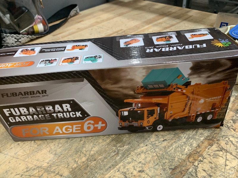 Photo 1 of Metal Garbage Truck Toys, Fubarbar 1:43 Bruder Tonka Trash Trucks Model for Boys Metal Diecase Waste Management Front Loader Die Cast Can Dumpster Truck Toy for 3 4 5 6 Years Old(Blue)