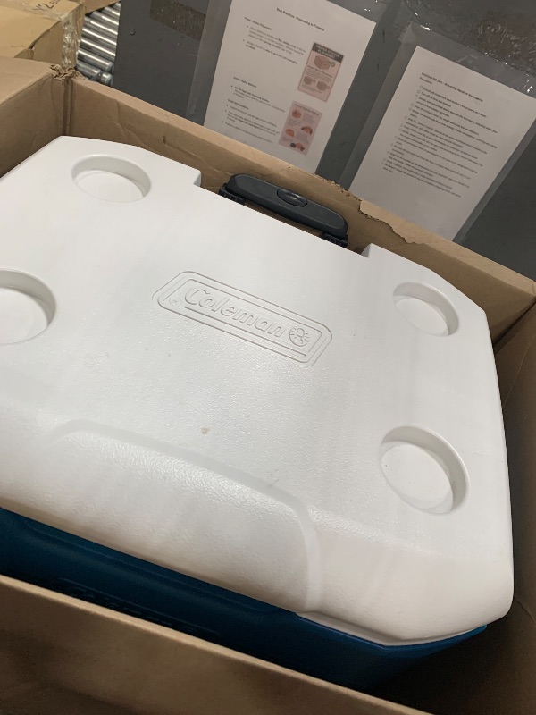 Photo 1 of ****PARTS ONLY********Coleman 60qt Rolling Cooler with Wheels, Insulated Portable Wheeled Chiller with Ice Retention, Made in USA