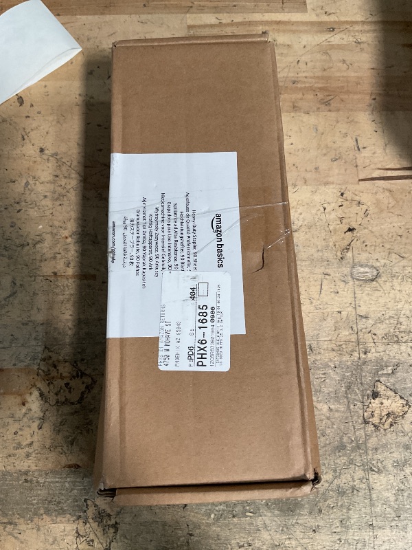 Photo 1 of Amazon Basics Heavy Duty Stapler, 90 Sheets High Capacity, Large Office Stapler with 1000 Staples, Black