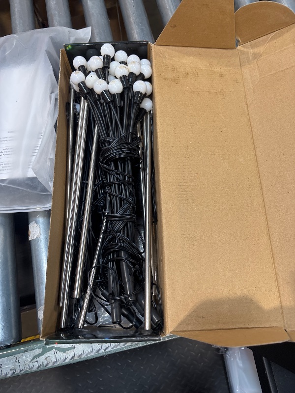 Photo 1 of **POSSIBLY FOR PARTS/MISSING PIECES** Pack Firefly Lights Solar Outdoor, Swaying Solar Garden Lights with Remote Control, 8 Flashing Modes and 20 Working Hours Garden Decor, Solar Outdoor Lights Decorative for Path Yard Patio