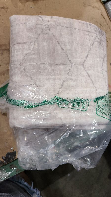 Photo 1 of **MSRP 28.99** nuLOOM 2' x 3' Machine Washable Area Rug with Waterproof Spill Proof Surface, Non Slip Backing and Stain Resistant for Living Room, Bedroom, Kitchen, Dining Room, Grier Light Grey