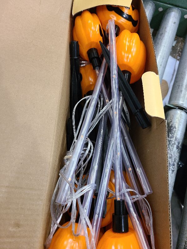 Photo 1 of 12 Pack Solar Pumpkin Lights for Halloween Decorations Outdoor, Waterproof Halloween Pathway Lights with 8 Modes, Orange Purple and Green Halloween Walkway Stake Lights for Yard Garden Party Decor
