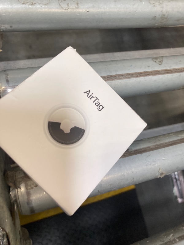 Photo 1 of Apple AirTag. Keep Track of and find Your Keys, Wallet, Luggage, Backpack, and More. Simple one-tap Set up with iPhone or iPad