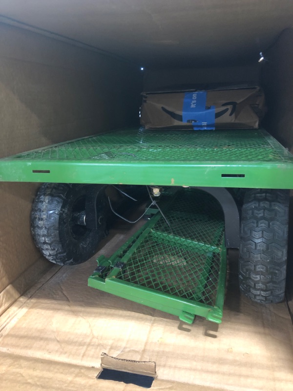 Photo 1 of ***HAS BEEN USED*****Gorilla Carts Steel Utility Garden Cart with No-Flat Tires, 4 Cubic Feet, 800-Pound Capacity, Green, Amazon Exclusive