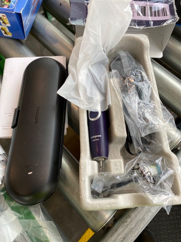 Photo 1 of ***DIRTY*** Philips Sonicare ProtectiveClean 6100 Rechargeable Electric Toothbrush, with Pressure Sensor, 3 Cleaning Modes, SmarTimer and QuadPacer, 14-Day Battery Life, Travel Case, Deep Purple, Model HX6471/03..