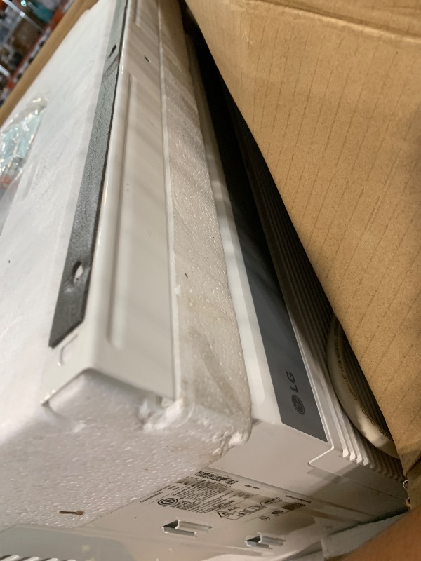 Photo 1 of ***VERY USED***PARTS ONLY*****LG LW1025RSMX Window Conditioner, Wi-Fi Enabled w/Remote, 450 Sq.Ft, 4-Way Air Deflection, 2 Cooling and Fan Speeds with Auto Fan Function, 115V, 10,000 BTU, White