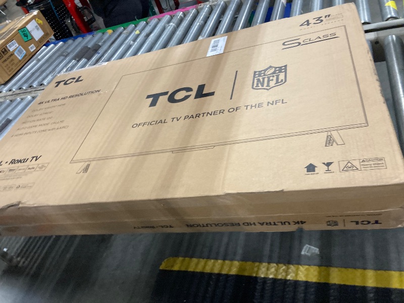 Photo 1 of ** DAMAGE MINOR FUNCTIONAL CHECK PHOTO** TCL 43-Inch Class S4 4K LED Smart TV with Roku TV (43S450R, 2023 Model), Dolby Vision, HDR, Dolby Atmos, Works with Alexa, Google Assistant and Apple HomeKit Compatibility, Streaming UHD Television