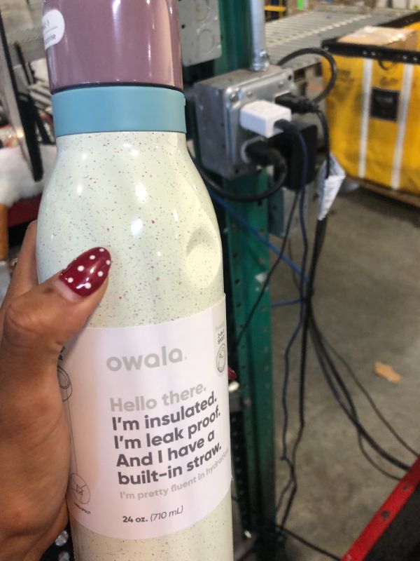 Photo 1 of **SMALL DENT** Owala FreeSip Twist Insulated Stainless Steel Water Bottle with Straw for Sports and Travel, BPA-Free, 24-oz, Confetti