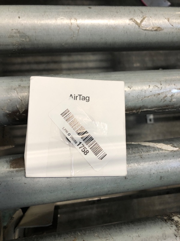 Photo 1 of Apple AirTag. Keep Track of and find Your Keys, Wallet, Luggage, Backpack, and More. Simple one-tap Set up with iPhone or iPad