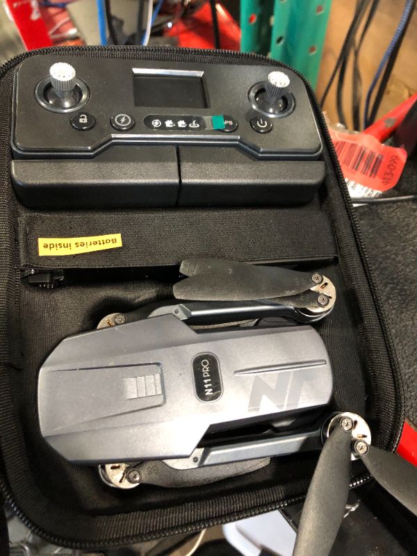 Photo 1 of ******ONE OF THE ARMS WON'T STAY OPEN******* N11 Pro 4K UHD Camera Drone for Adults GPS Assisted RC Quadcopter Offering 90 Min Long Flight Time, Auto Return Function, Follow Me Technology, Brushless Motor Stability, Extended Control Range, and 5G Transmis