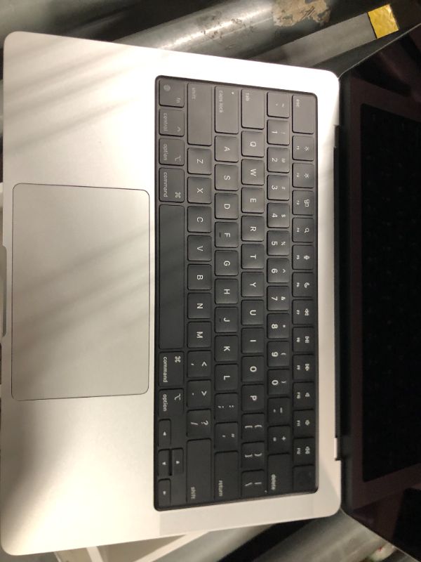 Photo 1 of **ONLY WORKS WHILE PLUGGED IN, NEEDS A NEW BATTERY REPLACEMENT** Apple 2023 MacBook Pro Laptop with Apple M2 Pro chip with 10?core CPU and 16?core GPU: 14.2-inch Liquid Retina XDR Display, 16GB Unified Memory, 512GB SSD Storage. Works with iPhone/iPad; Si