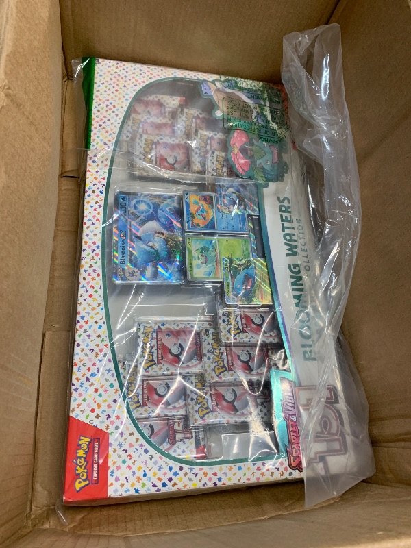 Photo 1 of ***FACTORY SEALED***
Pokemon TCG: Blooming Waters 151 Premium Collection - 12 Packs, Promos