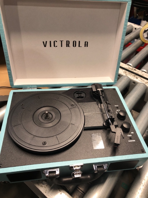 Photo 1 of (used) Victrola Journey Bluetooth Portable Suitcase Record Player – with Built-in Speakers, 3 Speed Vinyl Record Player, RCA Out, Headphone Jack (Turquoise)