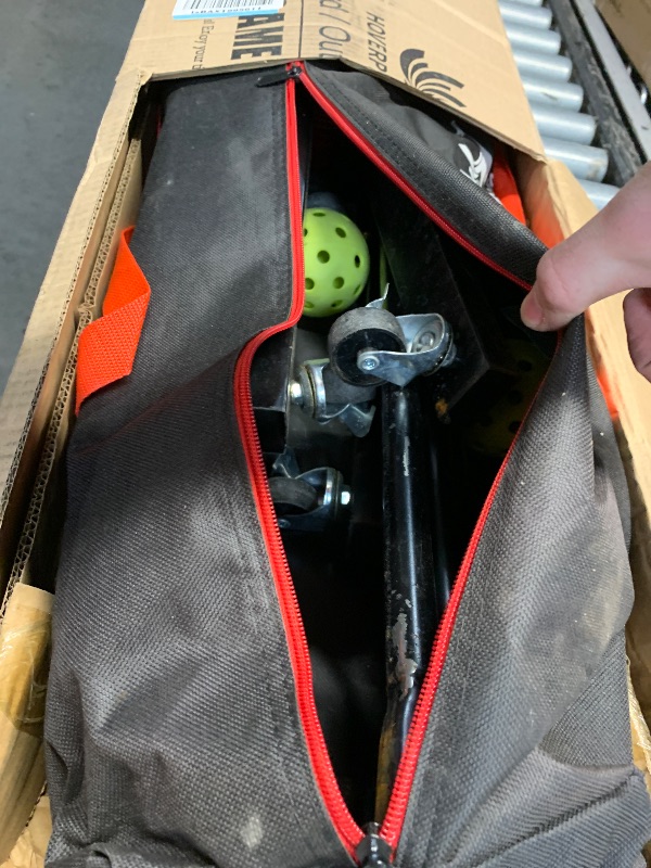 Photo 1 of ***(USED/ UNKNOWN IF MISSING PARTS)***Hoverphenix Pickleball Net with Wheels, Driveway Pickleball Set with Net and 4 Lightweight Fiberglass Pickleball Paddles, 8 Outdoor Pickleballs, Pickleball Court Marking Kit and Portable Carry Bag