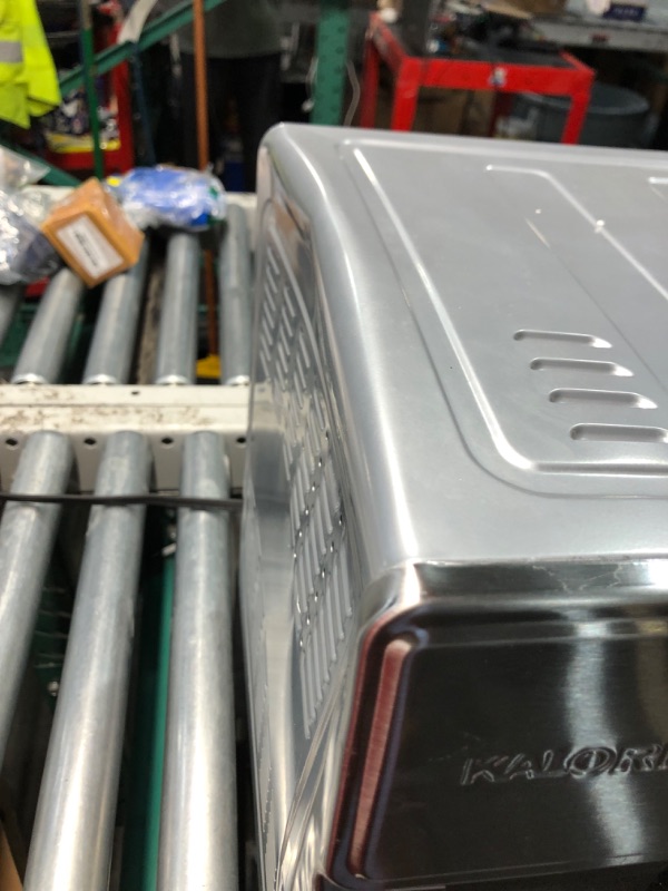 Photo 1 of ***DAMAGED - CORNER CAVED IN - KNOB BROKEN OFF - SEE PICTURES***
Kalorik MAXX Air Fryer Oven, 26 Quart 10-in-1 Countertop Toaster Oven & Air Fryer Combo - Fry, Bake, Roast, Rotisserie, & More, Large Glass French Doors & 9 Accessories, 1700-Watts, Stainles