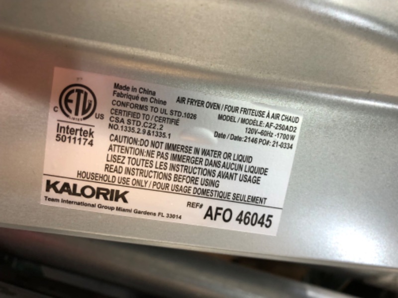 Photo 1 of ***DAMAGED - CORNER CAVED IN - KNOB BROKEN OFF - SEE PICTURES***
Kalorik MAXX Air Fryer Oven, 26 Quart 10-in-1 Countertop Toaster Oven & Air Fryer Combo - Fry, Bake, Roast, Rotisserie, & More, Large Glass French Doors & 9 Accessories, 1700-Watts, Stainles