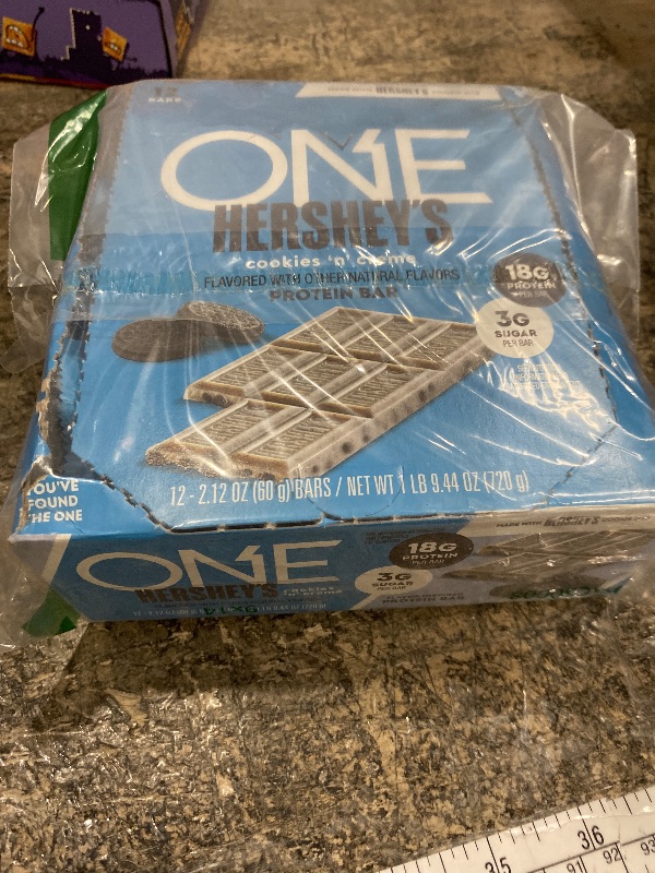 Photo 1 of **EXP: 09/2026** ONE Protein Bars, Hershey's Cookies 'n' Creme, Gluten Free with 18g Protein and 3g Sugar, Pantry Staples, 2.12 oz (12 Count)