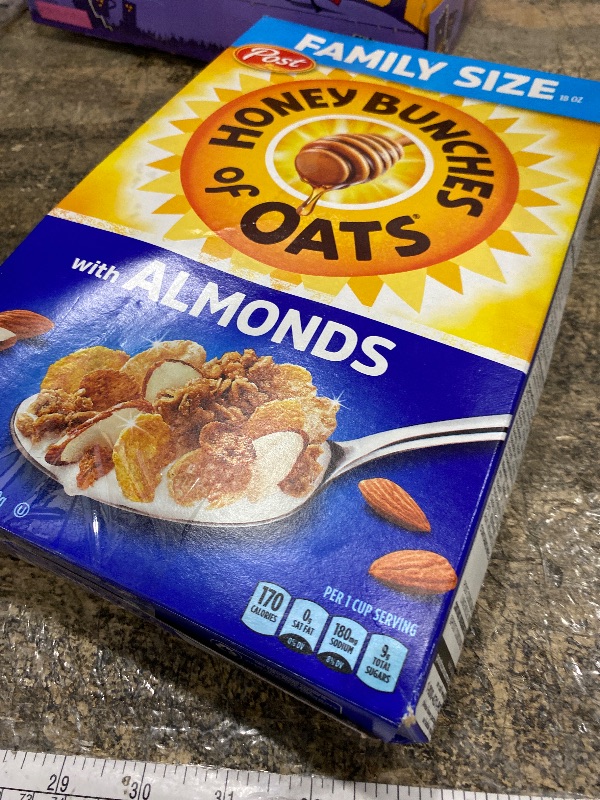Photo 1 of **EXP: 05/02/2026** Honey Bunches of Oats with Almonds Breakfast Cereal, Honey Cereal with Granola Clusters and Sliced Almonds, Family Size, 18 OZ Box