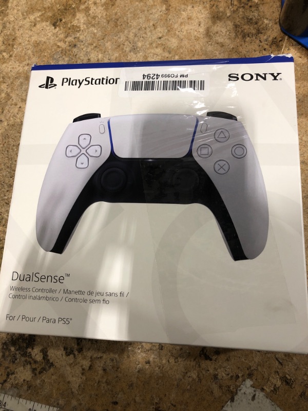 Photo 1 of ***Device is extremely dirty and does not function broken trigger and analog stick.
***PlayStation DualSense® Wireless Controller - White