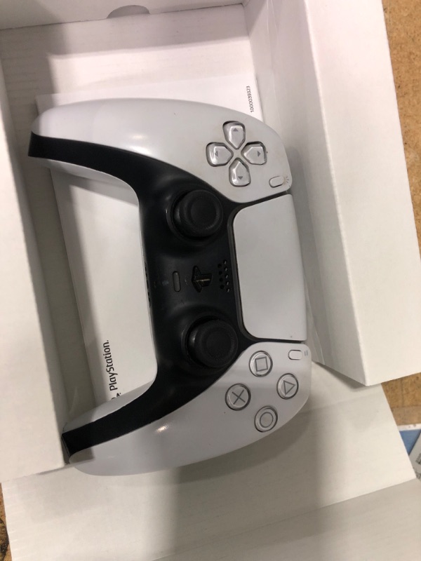 Photo 1 of ***Device is extremely dirty and does not function broken trigger and analog stick.
***PlayStation DualSense® Wireless Controller - White