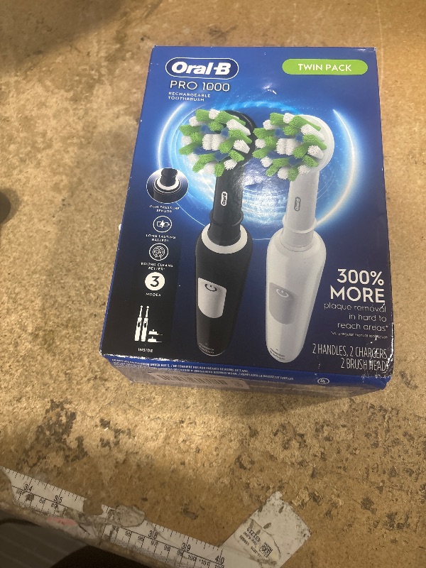 Photo 1 of ****************Missing one toothbrush****************
Oral-B Pro 1000 CrossAction Electric Toothbrush, Black and White, 2 Count