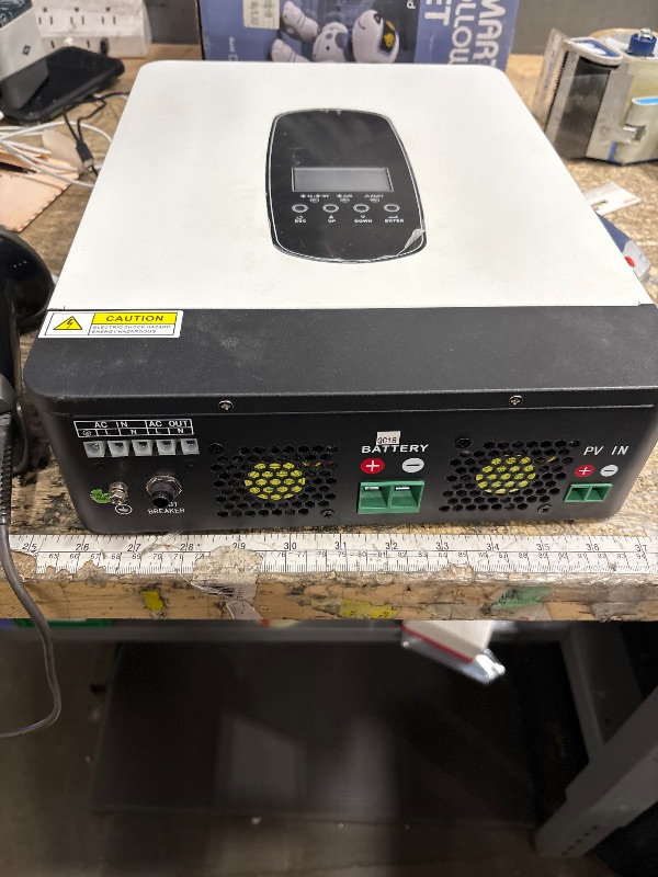 Photo 1 of **MISSING CHARGER**2400W Pure Sine Wave Hybrid Solar Inverter 24VDC Input 220 Output Built-in 50A PWM Solar Charger Controller and AC Charger