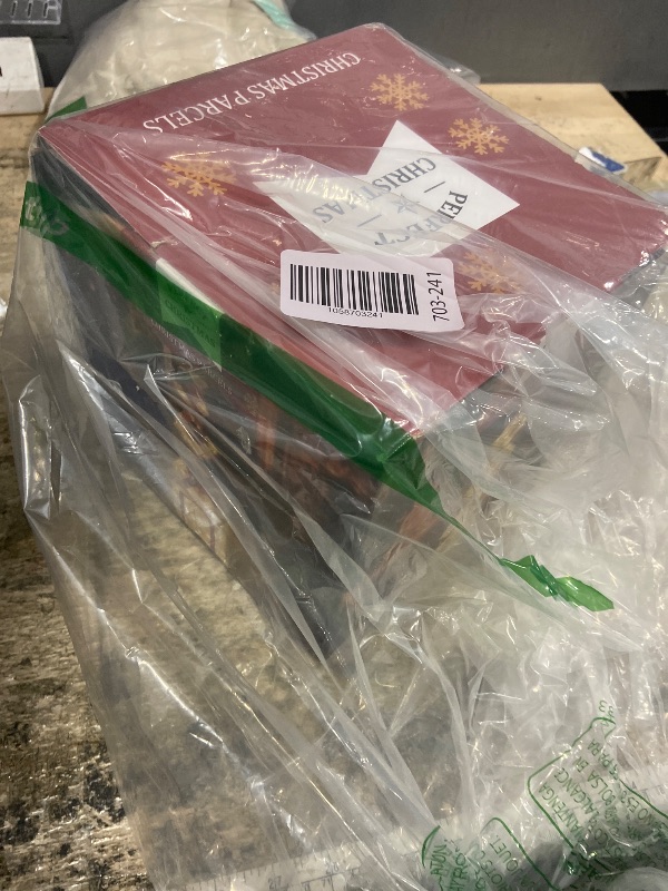 Photo 1 of **NEEDS BATTERIES**COVFEVER Christmas Lighted Gift Boxes Decorations Set of 4, 2.8Ft Stackable Christmas Nesting Boxes Battery Operated with Timer for Home and Party Decoration