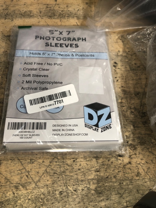 Photo 1 of (100 Count) Display Zone 5x7 Photograph Sleeves - Crystal Clear Penny Sleeves for Pictures, Prints and Postcards - Soft Plastic Photo Protectors - Oversized Trading Card Holders
