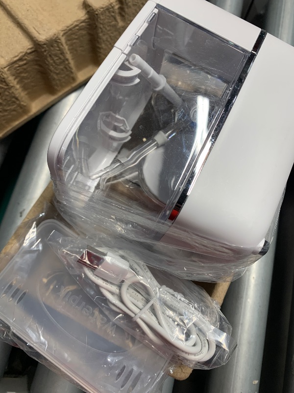 Photo 1 of (used) Waterpik ION Professional Water Flosser, Rechargeable and Portable for Teeth, Gums, Braces, 10 Settings, 7 Flossing Tips For Multiple Users And Needs