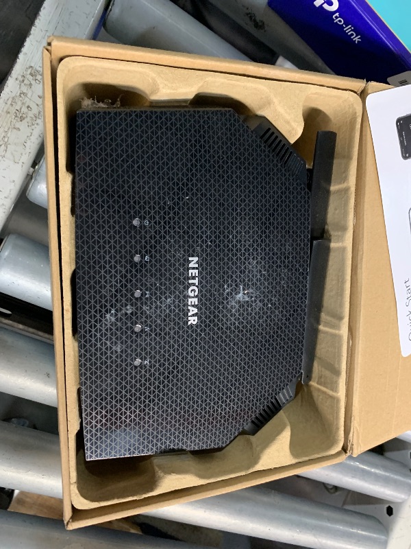 Photo 1 of ***(HEAVILY USED/ MINOR DAMAGE/ UNABLE TO TEST ITEM)***NETGEAR 4-Stream WiFi 6 Router (R6700AX) – Security Features, AX1800 Wireless Speed (Up to 1.8 Gbps), Covers up to 1,500 sq. ft., 20 Devices