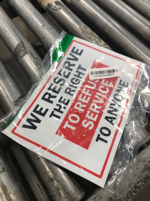 Photo 1 of "We Reserve the right to refuse service to anyone" Paper Sign