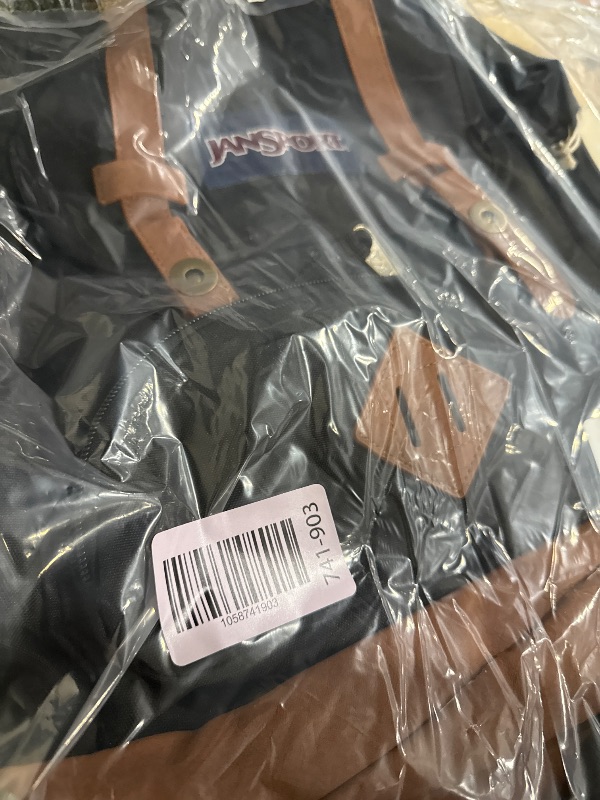 Photo 1 of **HAS MINOR TEARS ON BAG MATERIAL** JanSport Cortlandt Laptop Backpack, Black, 15” Laptop Sleeve-Synthetic Leather Shoulder Computer Bag with Large Compartment, Padded Straps- Rucksack for Men, Women