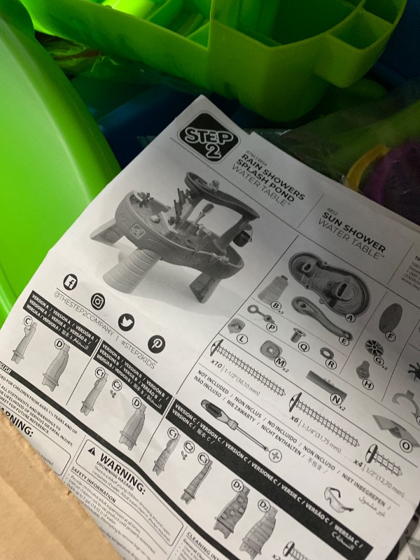 Photo 1 of ***FOR PARTS ONLY***USED - INCOMPLETE - 
Step2 Rain Showers Splash Pond Toddler Water Table, Kids Water and Sand Activity Sensory Playset, Summer Outdoor Toys, 13 Piece Toy Accessories, For Toddles 1.5+ Years Old