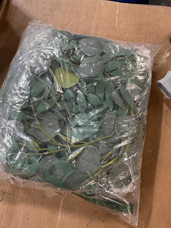 Photo 1 of (BAGGED) JUSTOYOU 5 Pack Fake Silver Dollar Eucalyptus Greenery Garland Plants, 6.5 Feet Artificial Eucalyptus Leaves Vines for Wedding Table Backdrop Arch Wall Decor Runner Doorways Decoration Indoor Outdoor