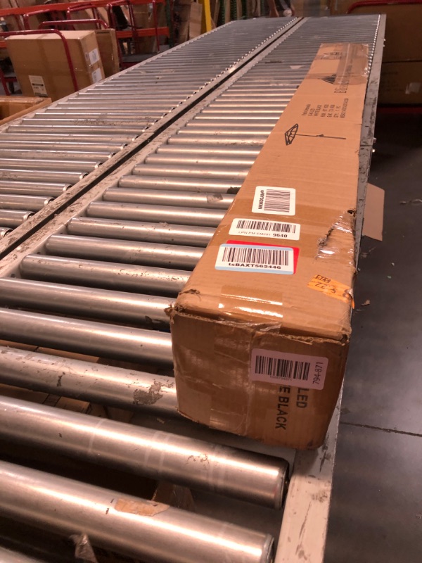 Photo 1 of (used item) Blissun 9 ft Solar Umbrella 32 LED Lighted Patio Umbrella Table Market Umbrella with Tilt and Crank Outdoor Umbrella for Garden