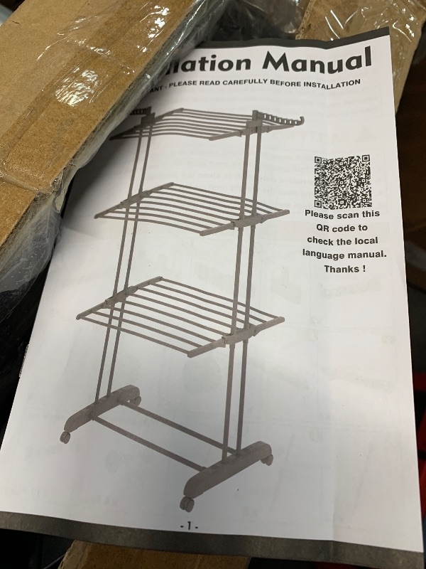 Photo 1 of (used)(missing pieces) HOMIDEC Clothes Drying Rack, Oversized 4-Tier(67.7" High) Foldable Stainless Steel Drying Rack Clothing, Movable Drying Rack with 4 castors