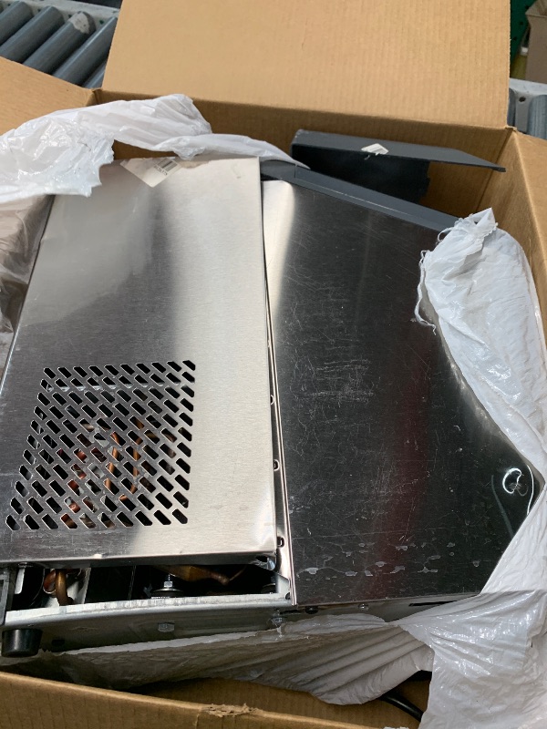 Photo 1 of (PARTS) (NOT FUNCTIONAL) (HEAVY DAMAGE) GE Profile Opal 1.0 Nugget Ice Maker| Countertop Pebble Ice Maker | Portable Ice Machine Makes up to 34 lbs of Ice Per Day | Stainless Steel