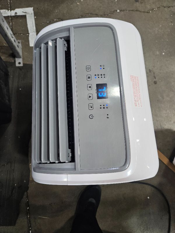 Photo 1 of 
BLACK+DECKER 10000 BTU DOE 115-Volt Vented Medium Room Portable Air Conditioner with Heater, Remote