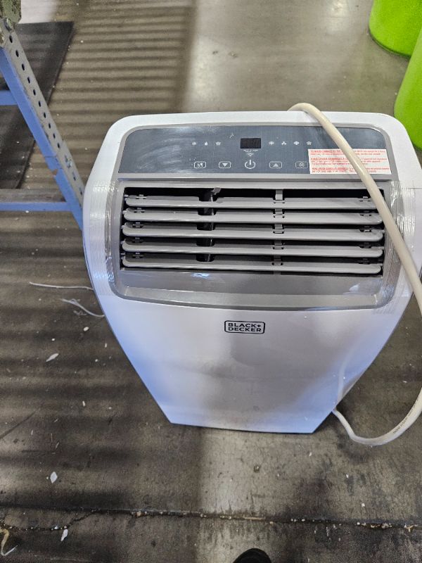 Photo 1 of *******************MISSING ALL ACCESSORIES EXCEPT REMOTE*****************
BLACK+DECKER Portable Air Conditioner, 12,000 BTU (8,000 BTU SACC) for Rooms up to 550 Sq. Ft., Portable AC with Follow Me Remote Control and Window Kit, BPACT12WT, White