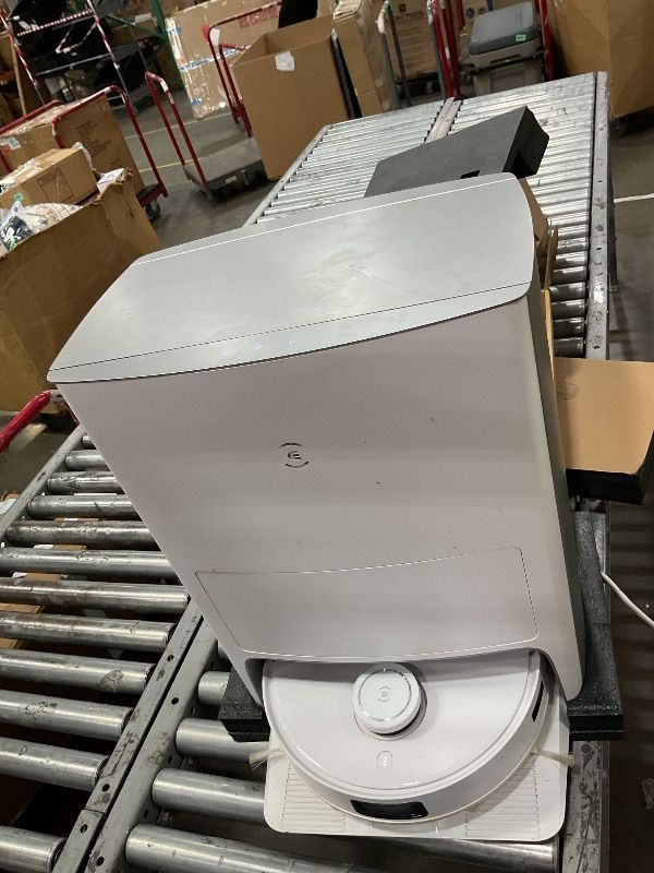 Photo 1 of *** Used item dirty, powers on unable to test further **** ECOVACS DEEBOT T10 OMNI Robot Vacuum and Mop Combo, Auto Self-Emptying, Auto Mop Cleaning, Hot Air Drying, 5000Pa Suction, OZMO TURBO Deep Mopping with Precision Mapping and Obstacle Avoidance, Wh