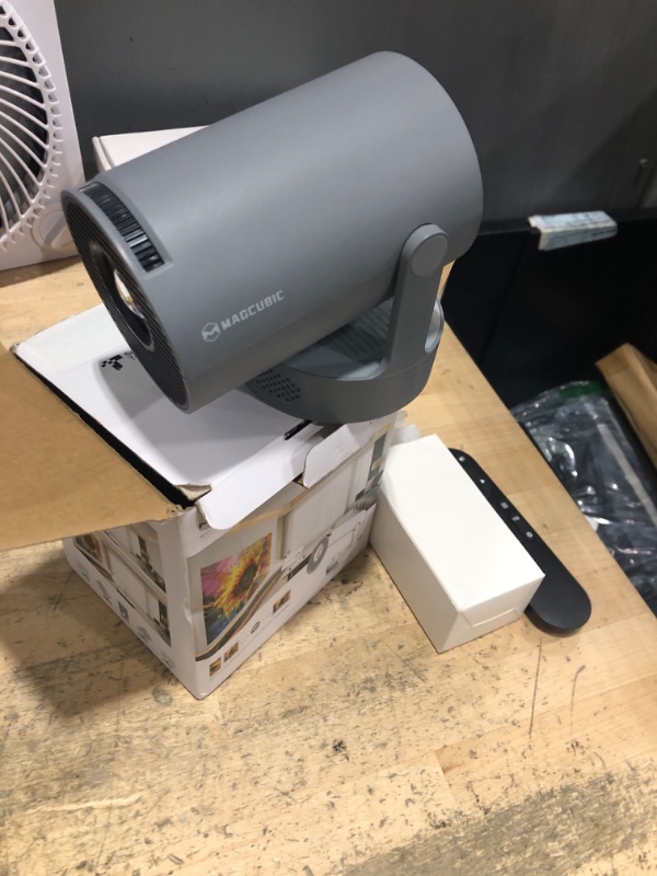Photo 1 of *************MISSING CHARGER*************
Magcubic Mini Projector with WiFi 6 and Bluetooth 5.4, Portable Projector 4K support, 5w Soundbase Speaker, Auto Vertical Keystone 180°Rotatable Smart Proyector for Movie Home Outdoor HY300Pro+ (Grey)