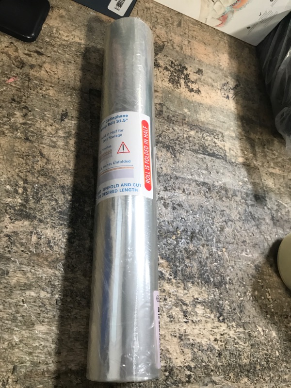 Photo 1 of 100 ft Clear Cellophane Wrap Roll (31.5 in x 100 ft) - 3 Mil Thicken Cellophane Roll, Clear Cellophane Bags Large, Clear Wrapping Paper for Flower Gift Baskets Wrap (31.5" fold into 16")