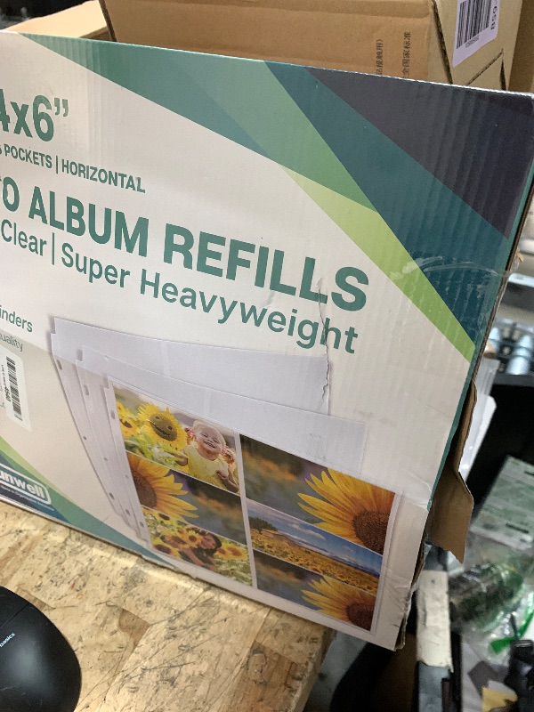 Photo 1 of Dunwell Photo Album Refill Pages 12x12, (50 Pack, 4x6 Horizontal) Holds 600 Pictures, Clear Plastic 4x6 Photo Sleeves for 3 Ring Binder, D-Ring Scrapbook Album, Acid-Free Poly Page Protectors