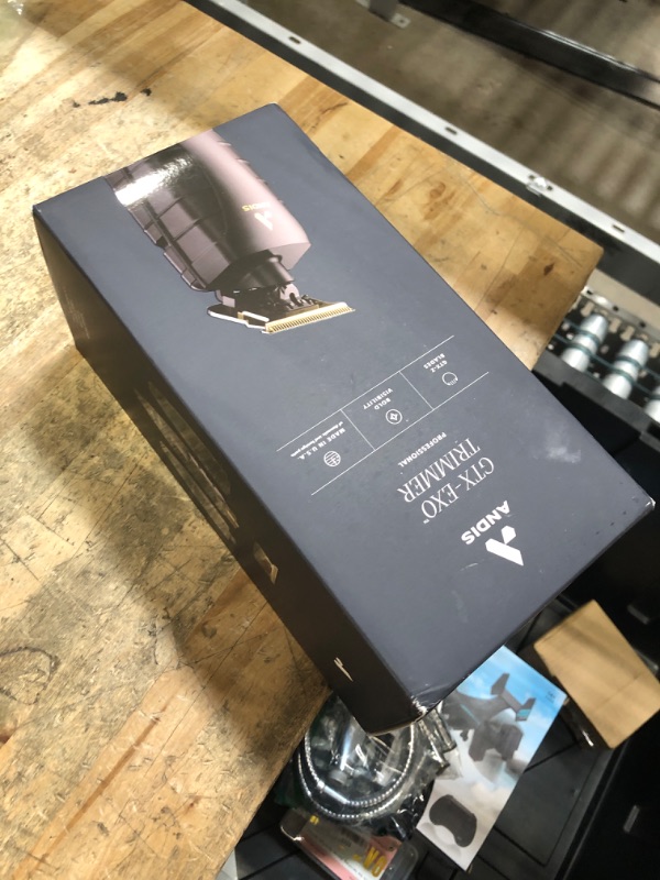 Photo 1 of **FOR PARTS/NON-FUNCTIONAL** Andis 74150 GTX-EXO Professional Cord/Cordless Lithium-ion Electric Beard & Hair Trimmer with Charging Stand, Black