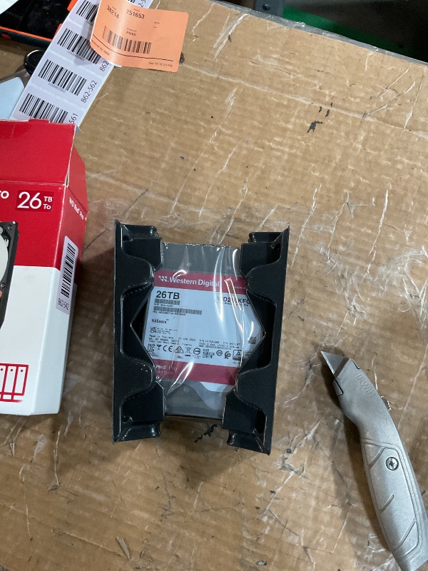 Photo 1 of ***(PARTS ONLY/ MAJOR DAMAGE/ NON FUNCTIONAL)***Western Digital 26TB WD Red Pro NAS Internal Hard Drive HDD - 7200 RPM, SATA 6 Gb/s, CMR, 512 MB Cache, 3.5" - WD260KFGX