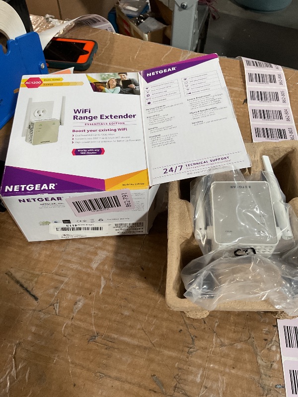 Photo 1 of (used/fair) NETGEAR WiFi Range Extender (EX6120) - Add up to 1,500 sq. ft., 25 Devices - AC1200 Dual Band Wireless Signal Booster & Repeater (Up to 1.2 Gbps Speed), Compact Wall Plug Design – Free Expert Help