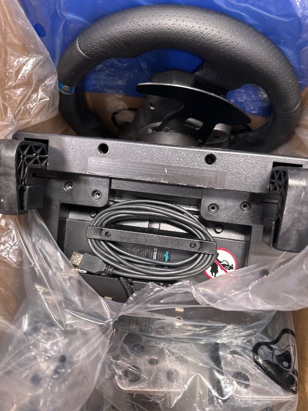 Photo 1 of ************NON-FUNCTIONAL, FOR PARTS ONLY************
Logitech G923 Racing Wheel and Pedals, TRUEFORCE up to 1000 Hz Force Feedback, Gaming Steering Wheel PS5, PS4, PC, Mac, Genuine Leather- Black